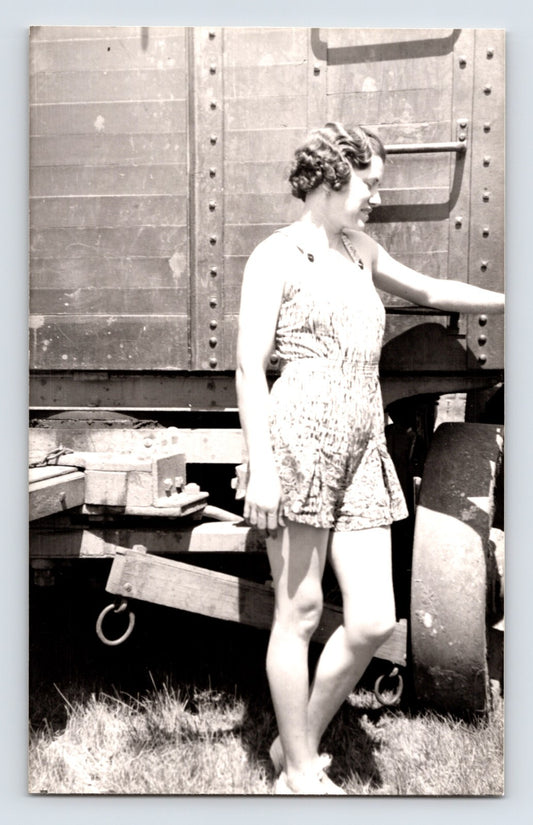 Barnes Sells Floto Circus 1940s circus showgirl performer standing beside circus wagon photograph