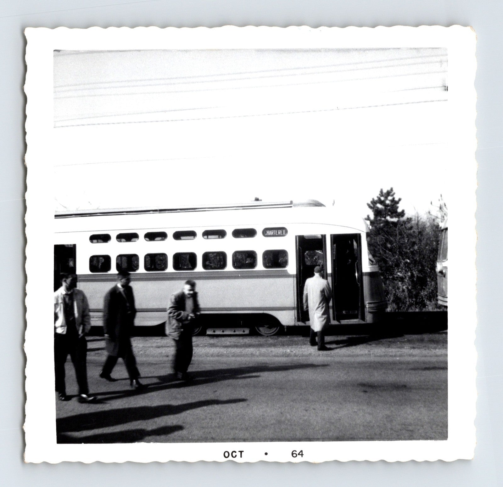 1964 streetcar marked Chartiers with passengers boarding, October 1964 trolley scene, black and white photograph
