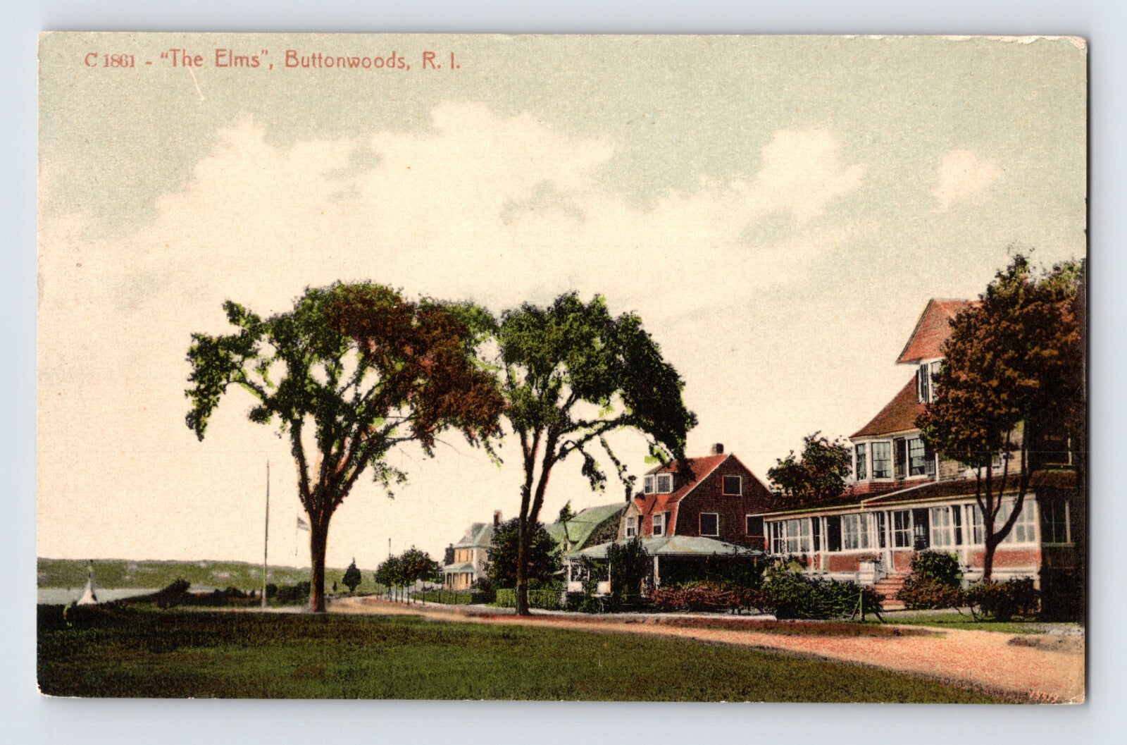 Buttonwoods Rhode Island The Elms residence along waterfront road with large trees and Victorian houses