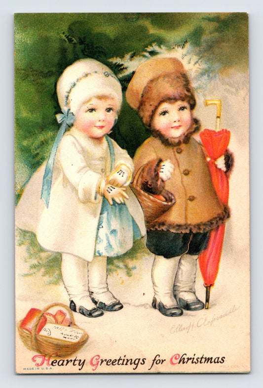 Children winter coats umbrella Christmas greetings 1922 postcard by Ellen Clapsaddle