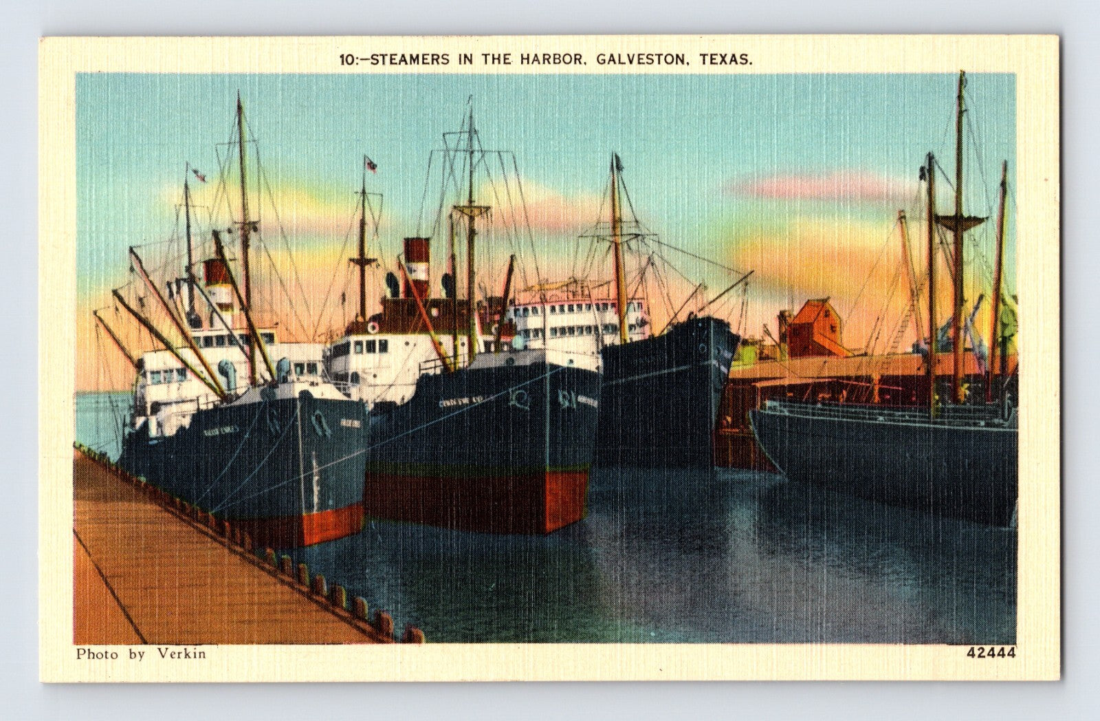 Steamer ships docked in Galveston harbor Texas with masts and cargo structures linen postcard
