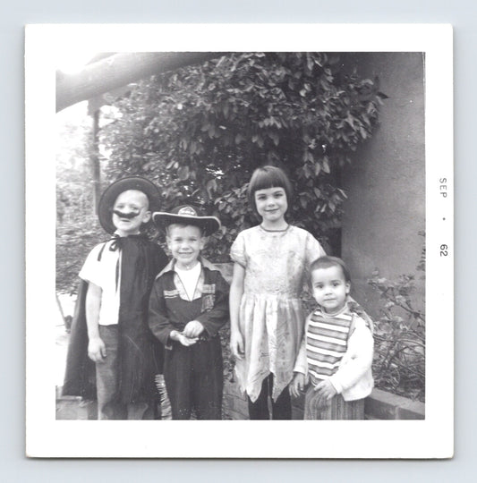 Halloween 1961 children costumes cowboy mask group outdoor snapshot vintage photo