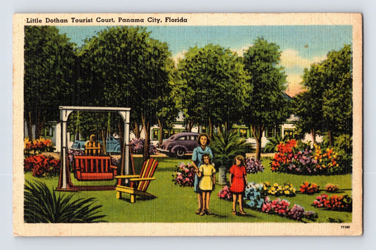 Panama City Florida Little Dothan Tourist Court 1940s postcard with landscaped motel grounds swing set children and parked automobile