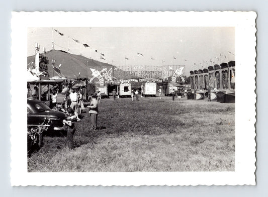 Ringling Bros Barnum Bailey circus entrance midway with sideshow banners and big top tent
