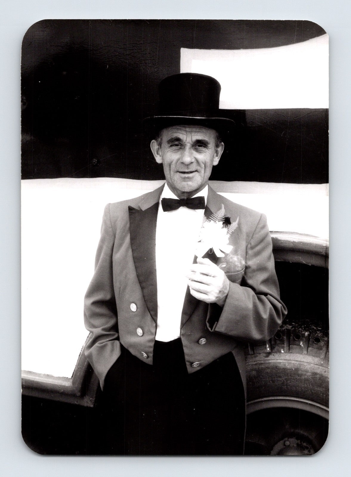 Mills Bros Circus 1962 ringmaster in top hat standing beside circus vehicle backstage photograph