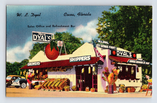 ard of W L Dyal citrus stand in Cocoa Florida with orange signage and 1949 postmark