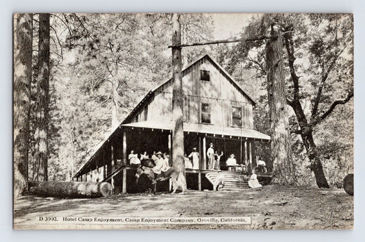 Oroville California Camp Enjoyment lodge building with people on porch forest setting early postcard