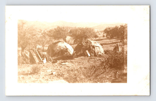 Native American dwellings wigwam homes 1910s real photo postcard with encampment scene