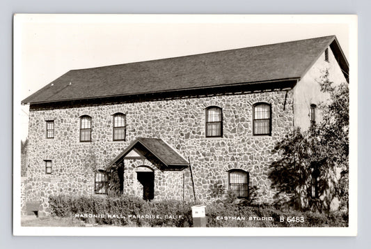 Stone Masonic Hall building in Paradise California real photo postcard showing two story masonry structure with central entrance and arched windows