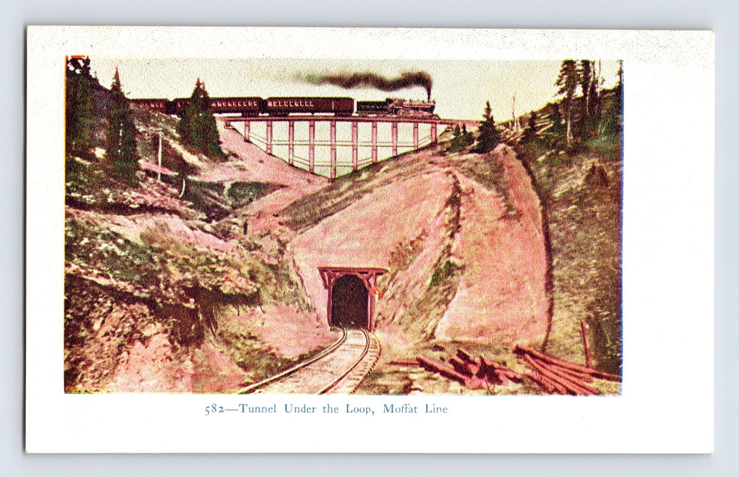 Moffat Road Colorado railroad train crossing trestle above tunnel loop mountain landscape postcard
