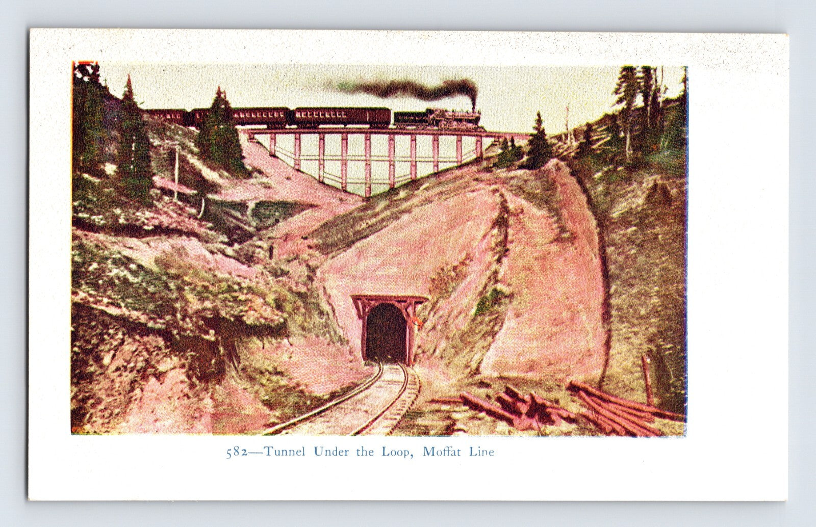 Moffat Road Colorado railroad train crossing trestle above tunnel loop mountain landscape postcard