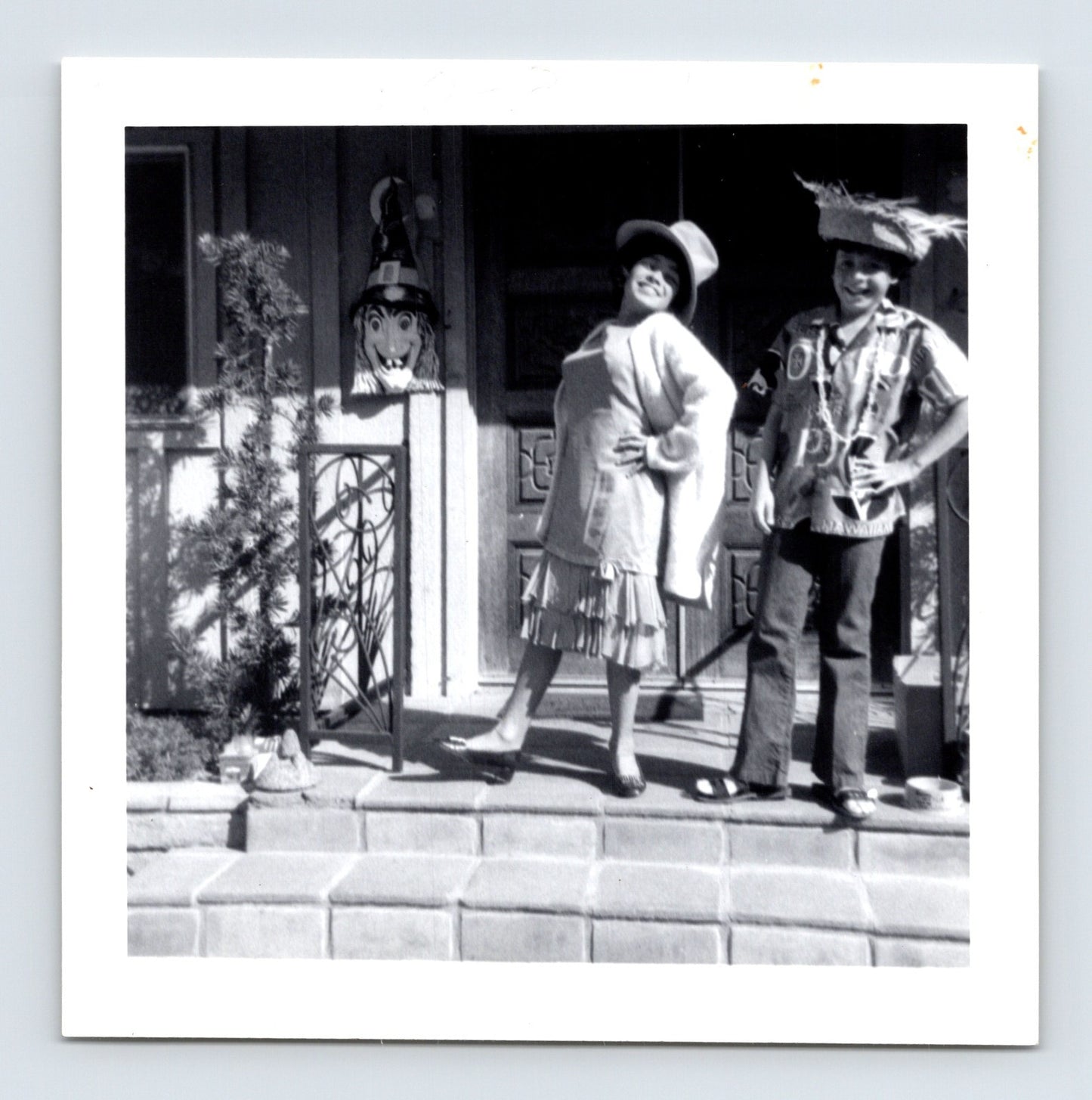 Vintage Halloween children costumes porch witch decoration doorway 1971 snapshot