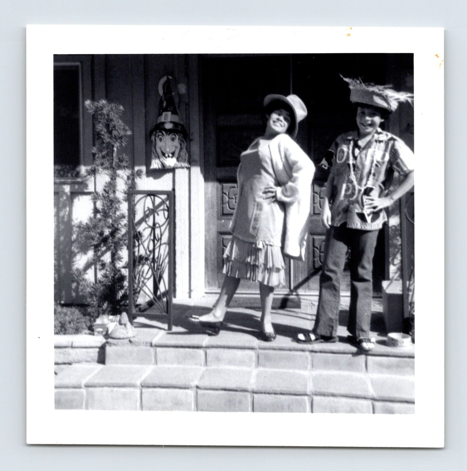 Vintage Halloween children costumes porch witch decoration doorway 1971 snapshot