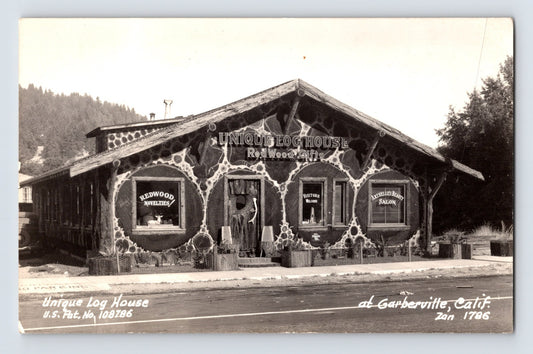Garberville California Unique Log House Redwood Gifts roadside attraction RPPC postcard with novelty timber building exterior