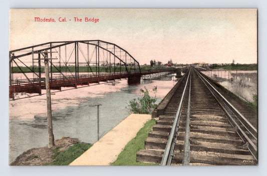 Modesto California Southern Pacific railroad bridge and track crossing river early twentieth century postcard