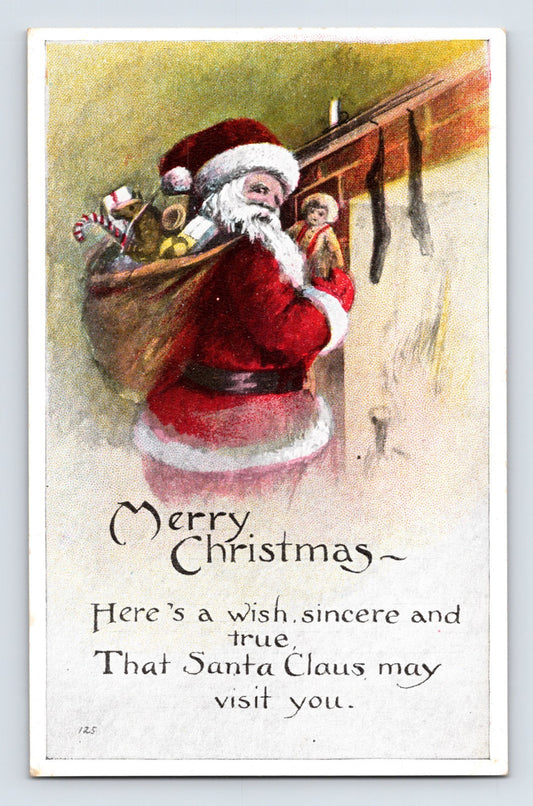 Santa Claus carrying toy-filled sack beside snowy rooftop on vintage Christmas postcard with holiday verse and Merry Christmas greeting.