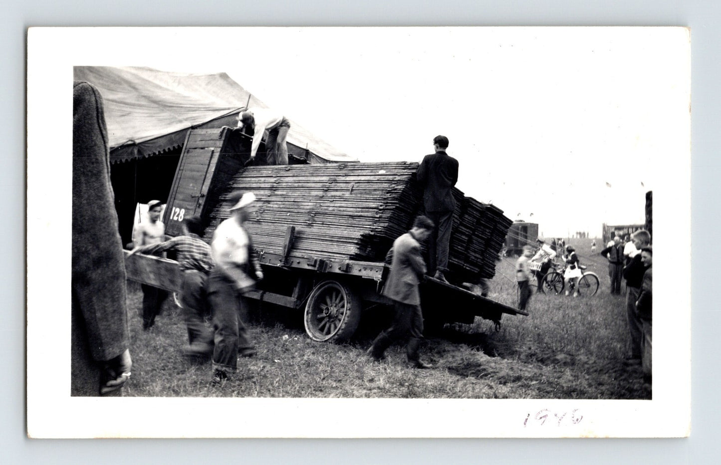 Clyde Beatty Circus 1946 photo unloading bleachers workers truck field setup scene