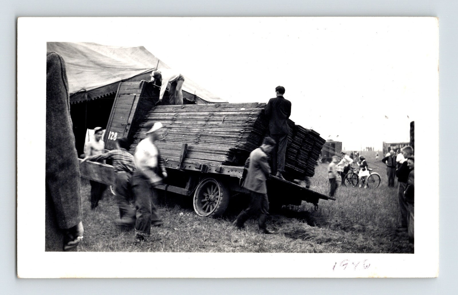 Clyde Beatty Circus 1946 photo unloading bleachers workers truck field setup scene