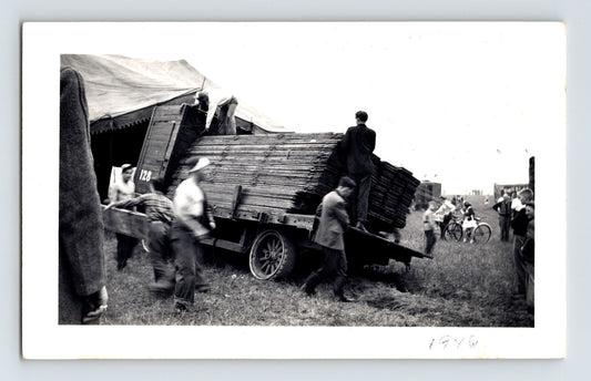 Clyde Beatty Circus 1946 photo unloading bleachers workers truck field setup scene