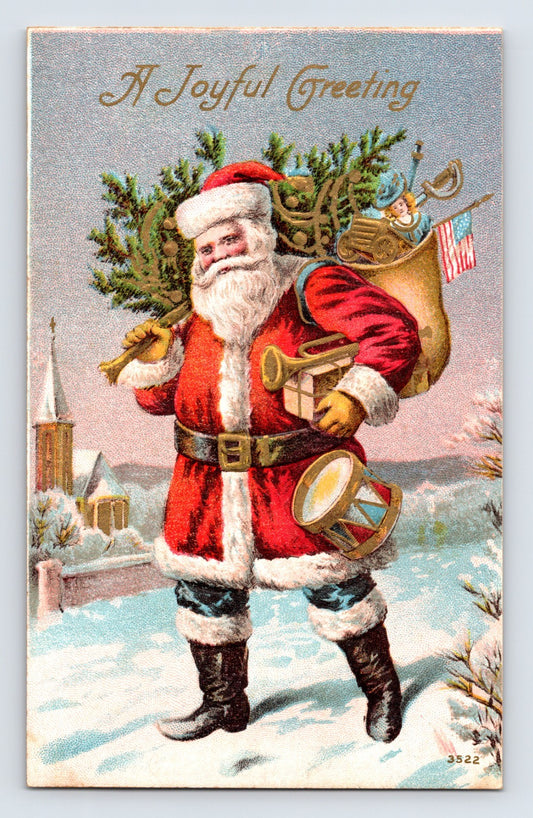 Santa Claus carrying a sack filled with toys, drum, trumpet, and American flag while walking through a snowy village landscape beside a church.