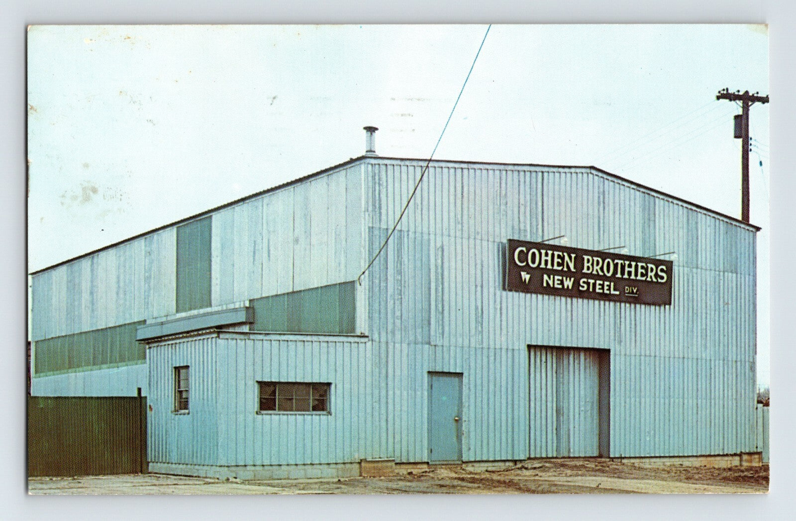 Middletown Ohio Cohen Brothers New Steel 1962 chrome postcard showing corrugated metal warehouse with roadside signage