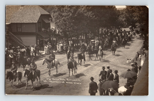 Old Home Week parade Rushford New York 1910s real photo postcard with mounted riders and crowd
