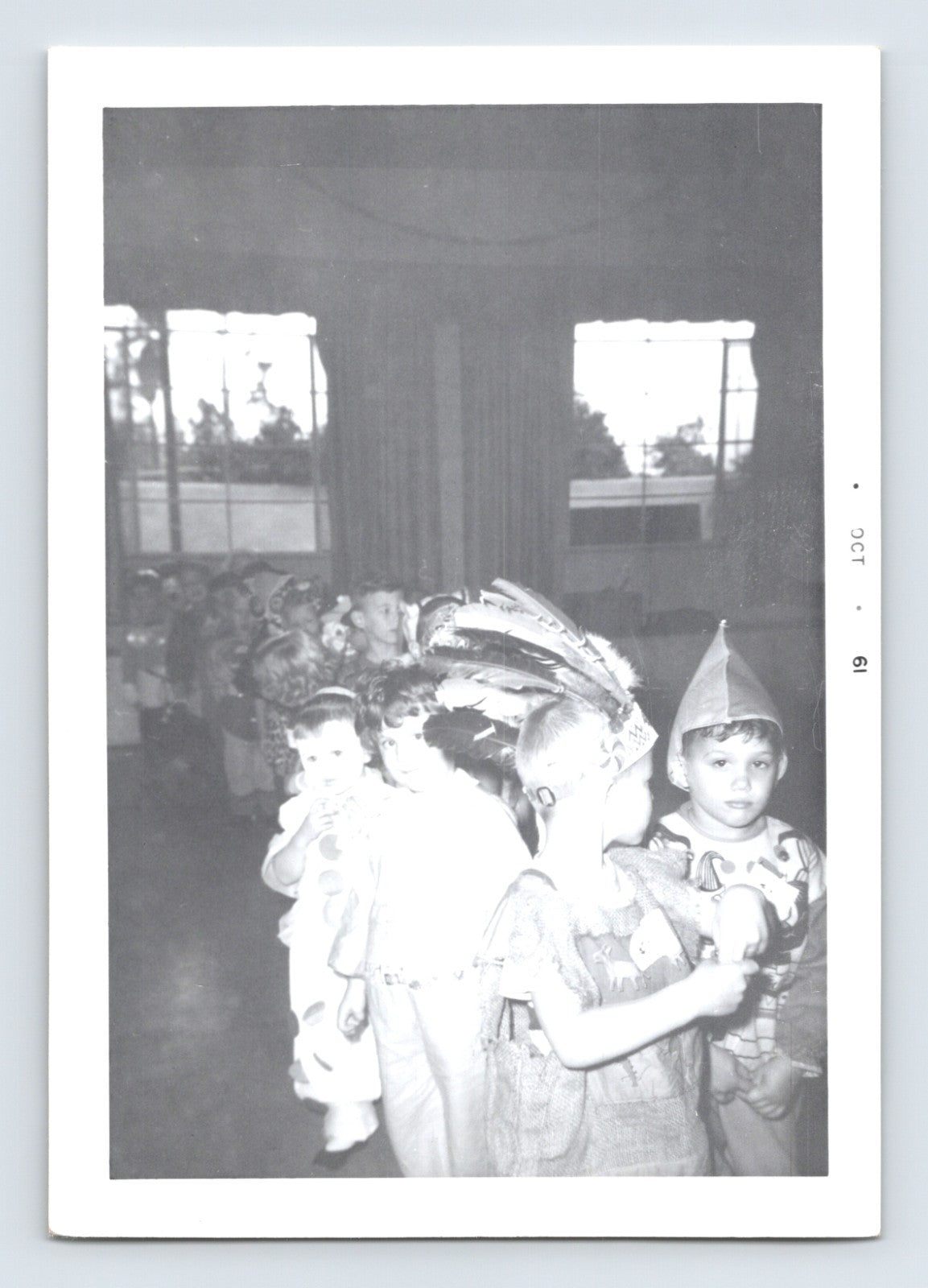 Halloween photo children costume parade classroom feather headdress clown indoor party 1961 snapshot October margin 5 x 3.5