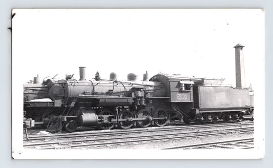 Black and white photograph of Canadian National 2-8-0 steam locomotive 2114 at Winnipeg rail yard 1948