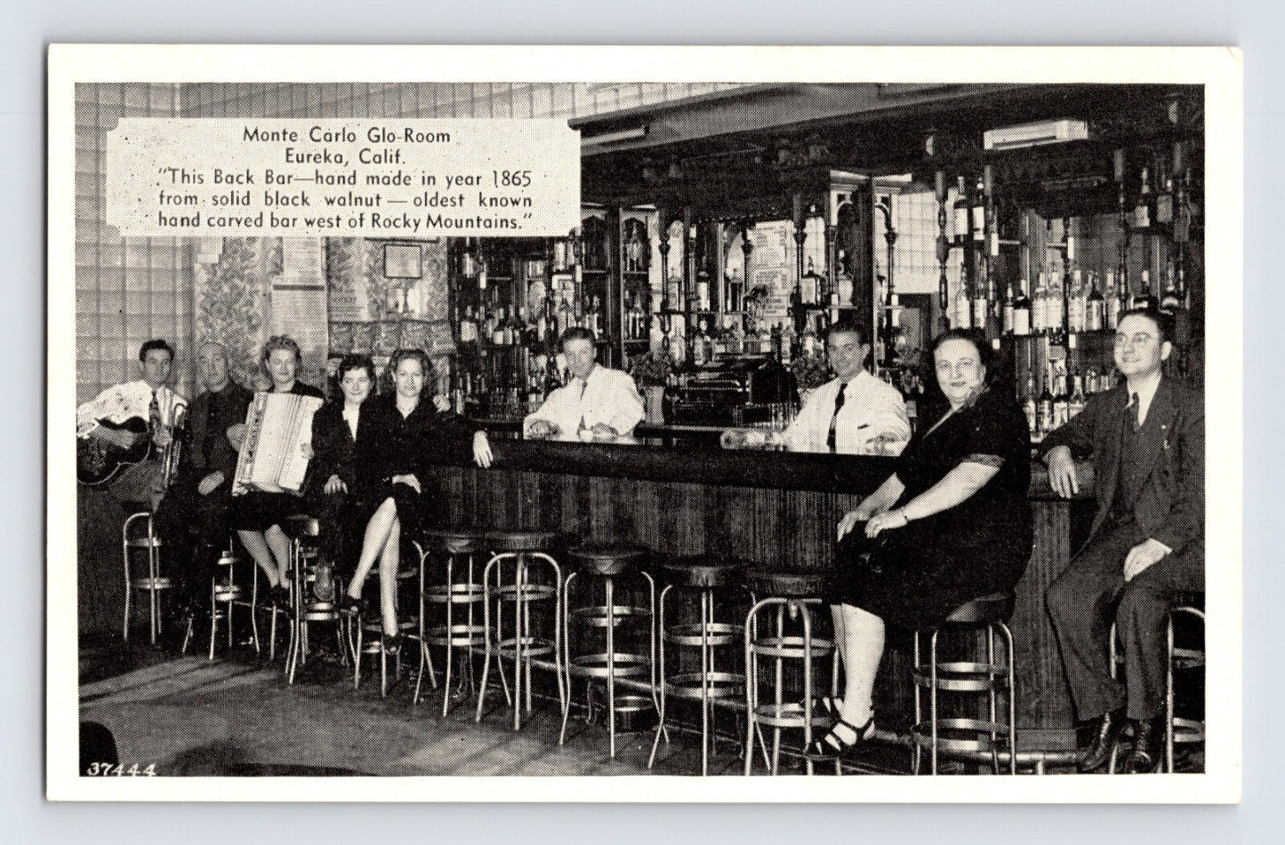 Eureka California Monte Carlo Glo Room bar interior 1940s postcard showing patrons seated at historic carved walnut back bar