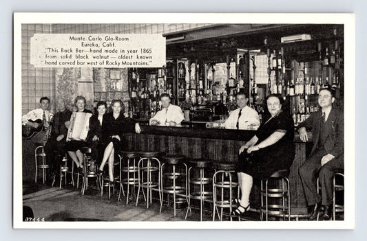 Eureka California Monte Carlo Glo Room bar interior 1940s postcard showing patrons seated at historic carved walnut back bar