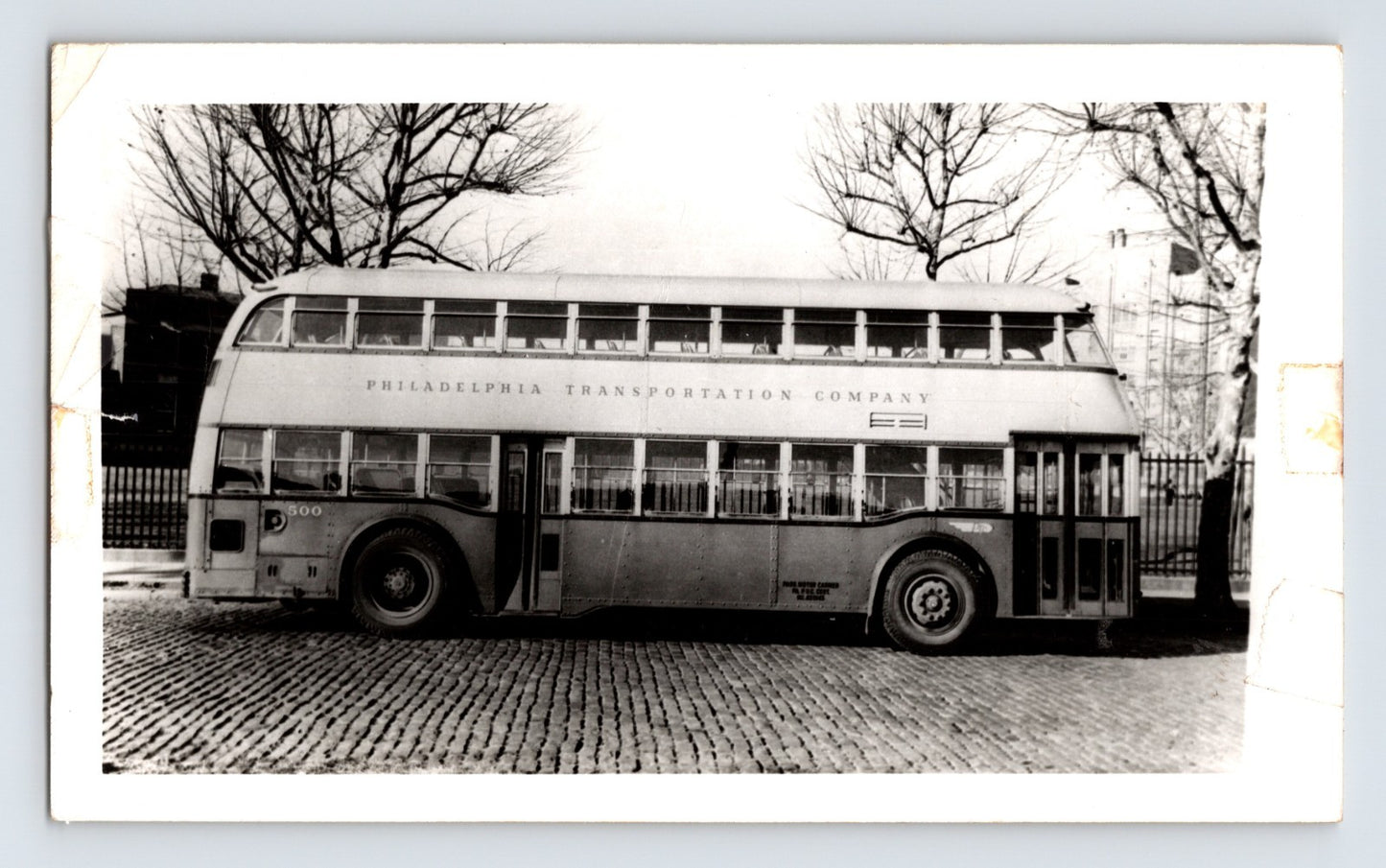 Philadelphia Transportation Company double decker bus on cobblestone street 1950s transit photo