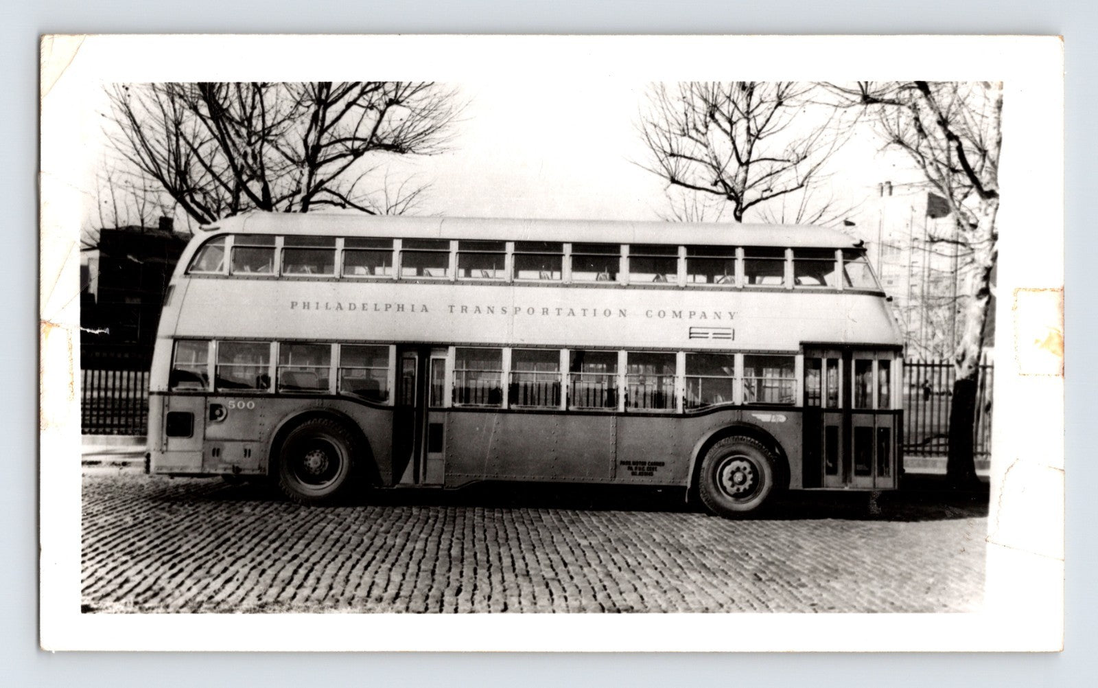 Philadelphia Transportation Company double decker bus on cobblestone street 1950s transit photo