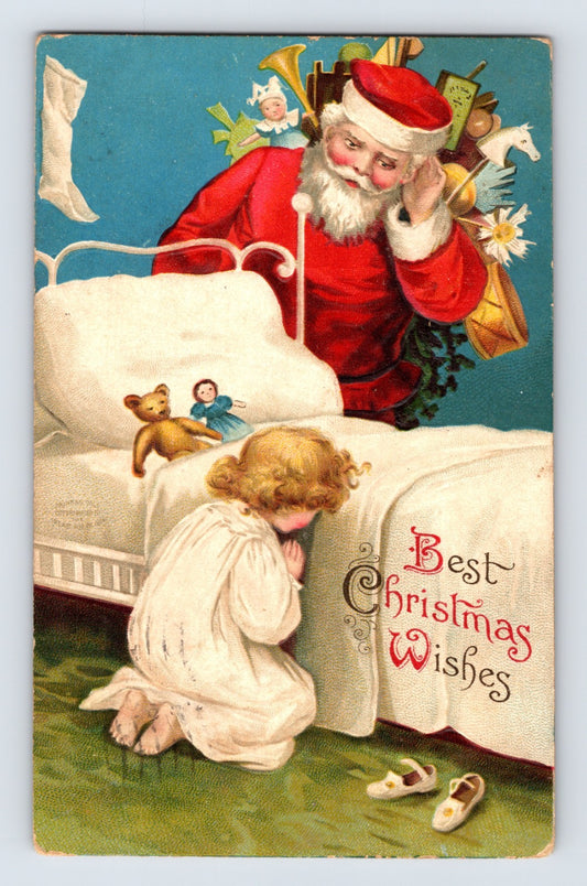 Santa Claus listens beside a child praying at bedside in a colorful embossed Christmas postcard mailed in 1908 with Kansas postmark and German publisher mark.