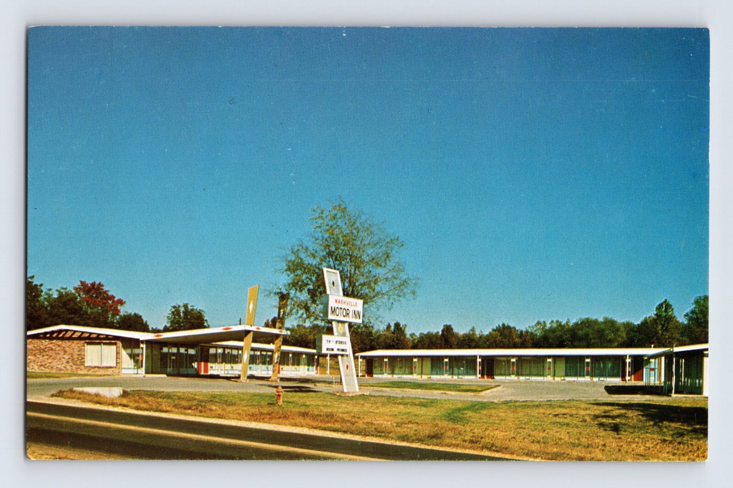 Nashville Arkansas Nashville Motor Inn motel with roadside sign and long motor court layout 1960s postcard