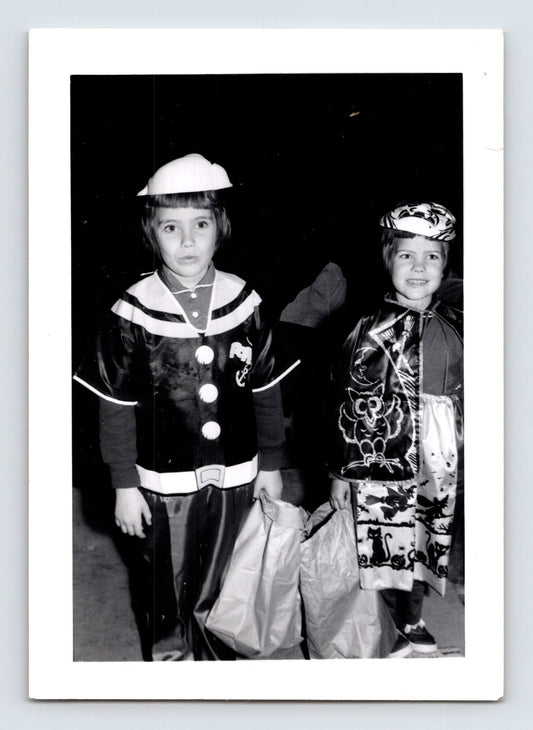 Halloween photo children costumes trick or treat bags 1960s snapshot kids holding candy bags costume outfits 4.5 x 3.25