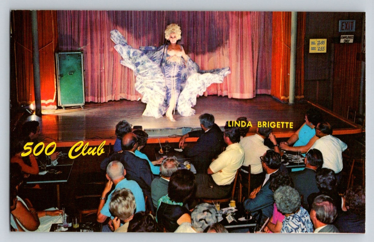 Color chrome postcard showing Linda Brigitte performing on stage at the 500 Club in New Orleans, with seated audience at small tables in a classic mid-century nightclub setting.