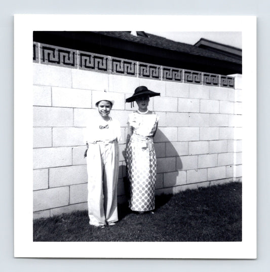 Halloween children costume dress wide brim hat bow tie outfit mid century backyard cinder block wall 1950s photo 3.5 x 3.5