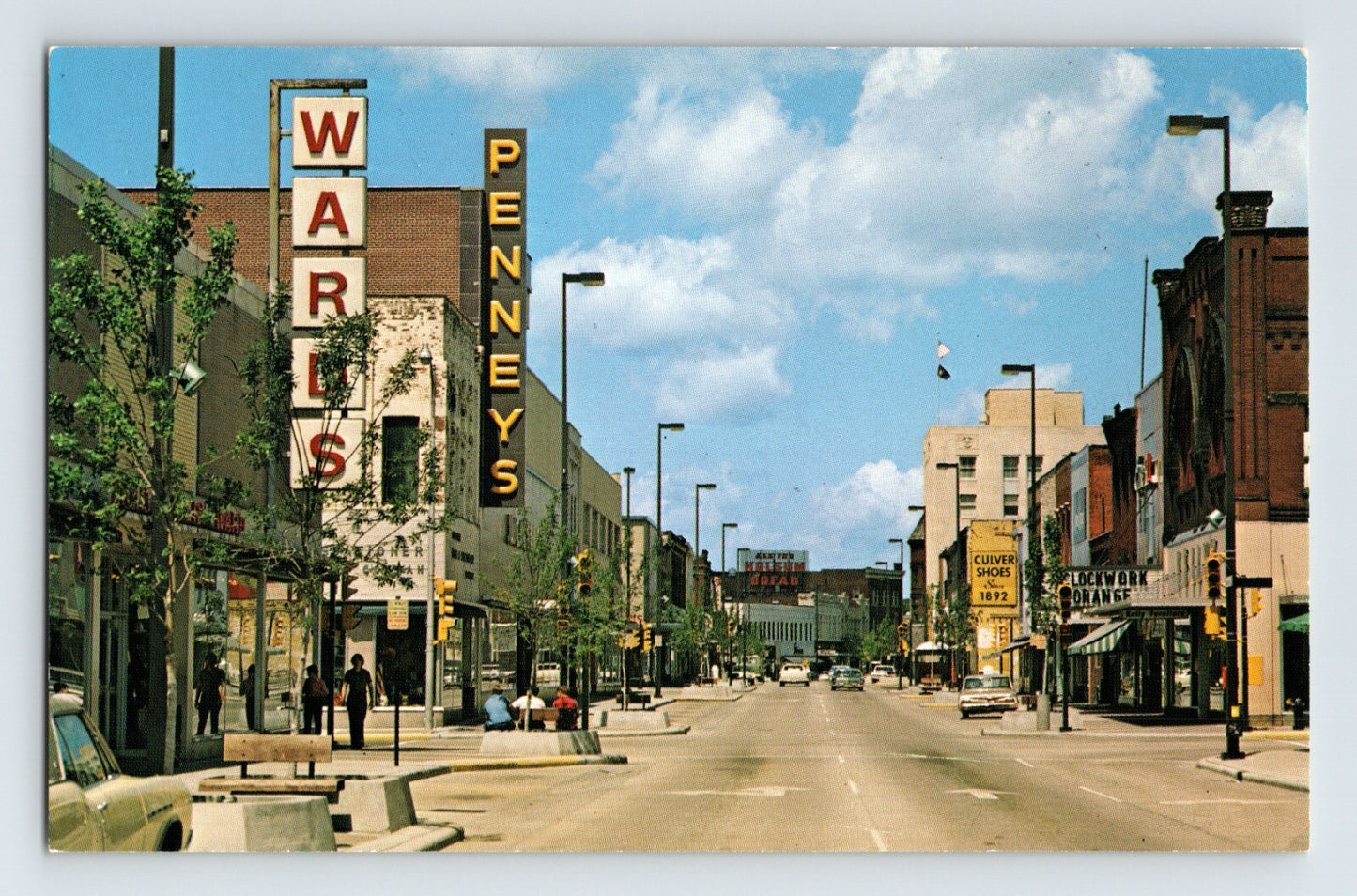 Eau Claire Wisconsin 1970s downtown street view Wards Penneys storefronts cars mid century retail signage chrome postcard