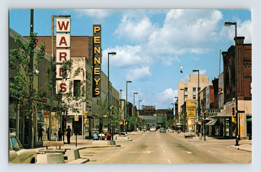 Eau Claire Wisconsin 1970s downtown street view Wards Penneys storefronts cars mid century retail signage chrome postcard