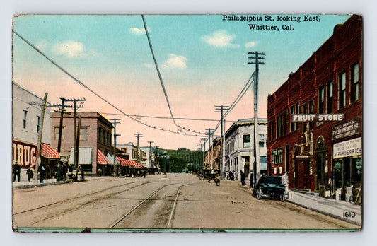 1910s Philadelphia Street Whittier California with streetcar tracks storefronts and fruit store unposted postcard