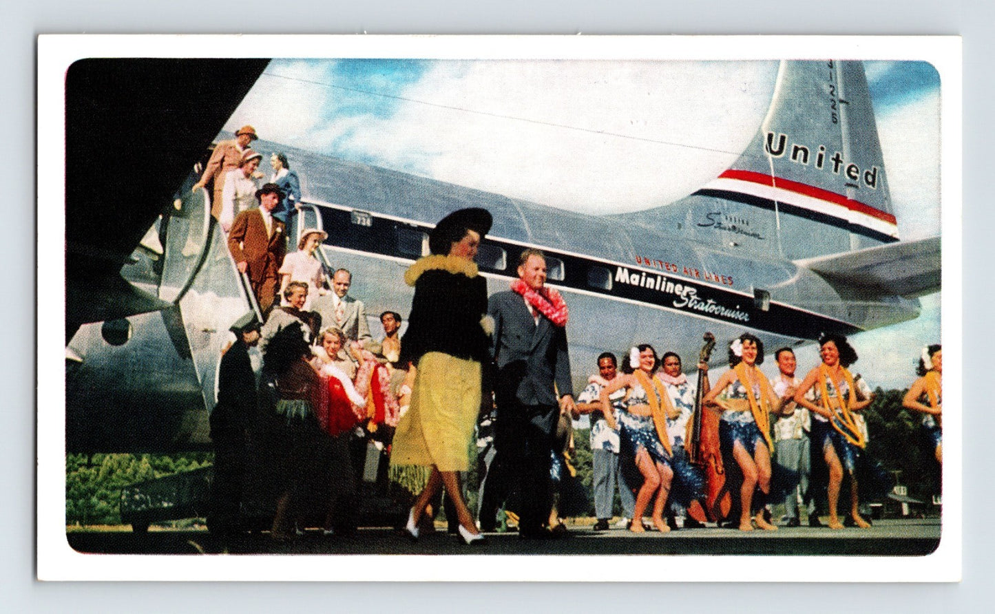 United Airlines Mainliner Stratocruiser Hawaii passengers dancers 1950s postcard