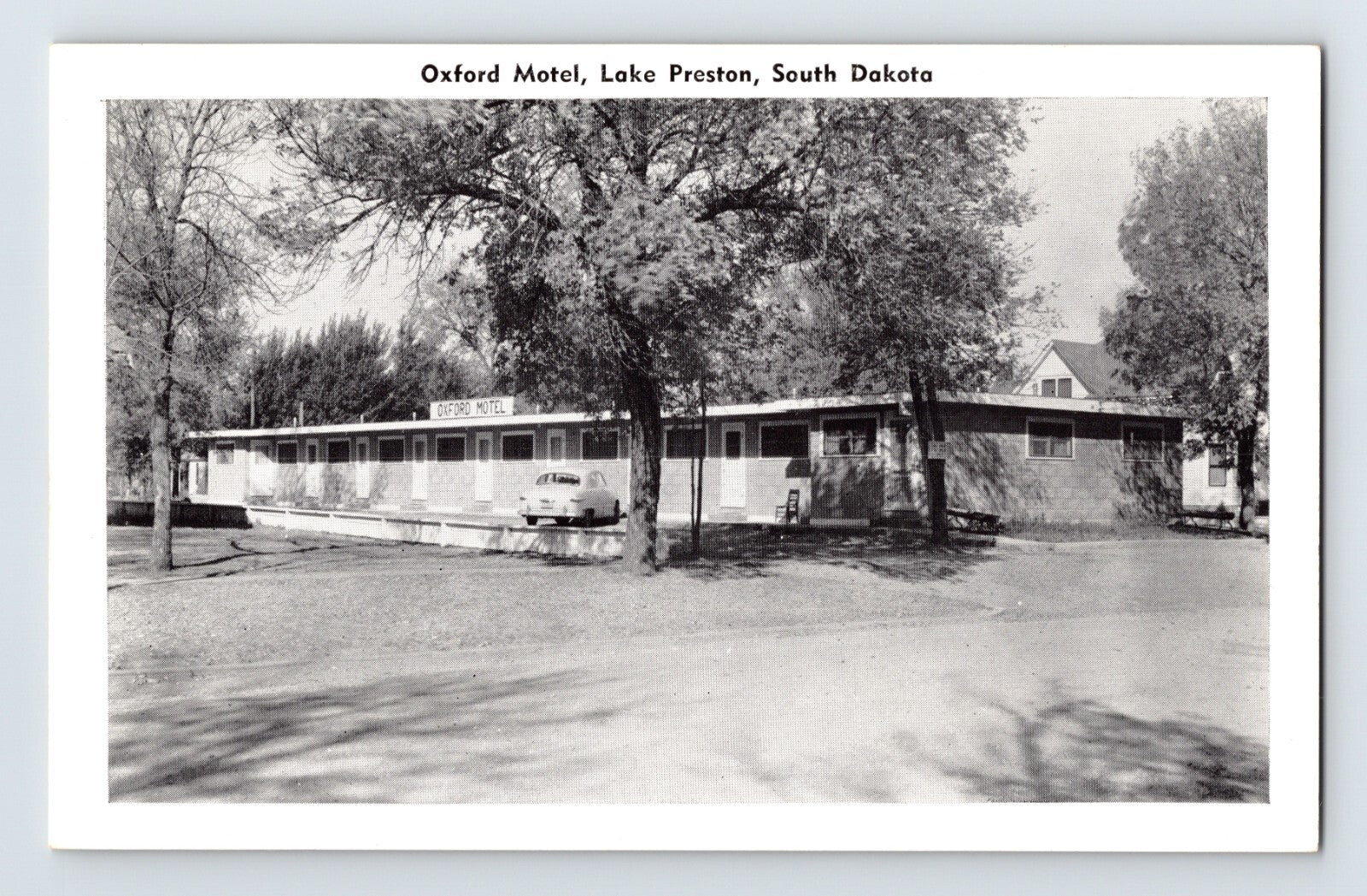 1940s Oxford Motel in Lake Preston South Dakota with single-story motor court and parked car