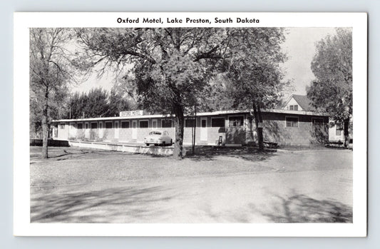 1940s Oxford Motel in Lake Preston South Dakota with single-story motor court and parked car