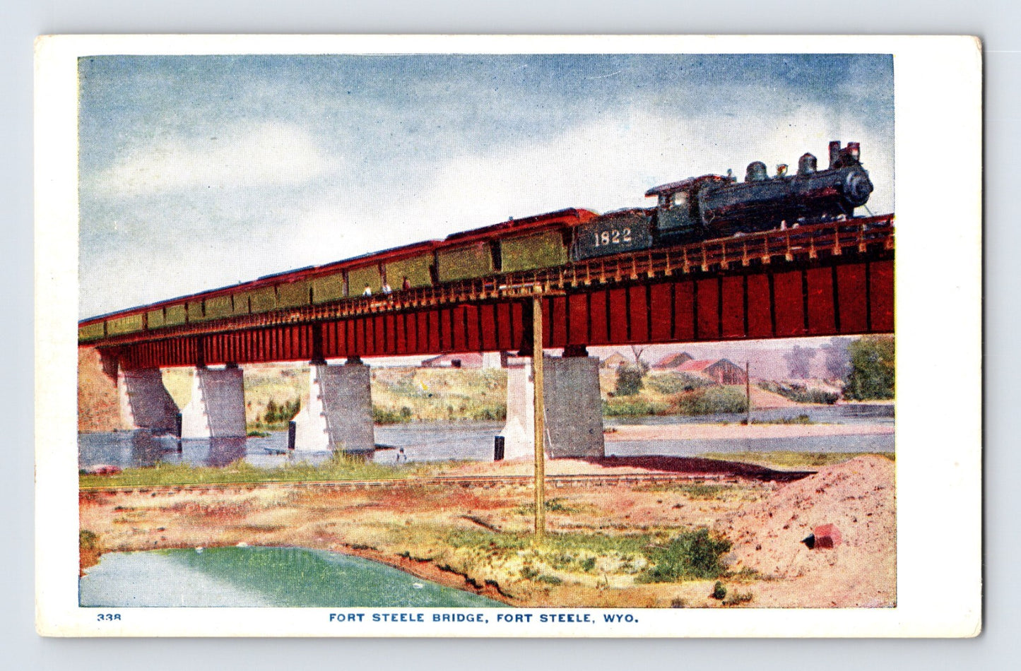 Fort Steele Wyoming railroad train crossing Steele Bridge steam locomotive river scene 1910s postcard