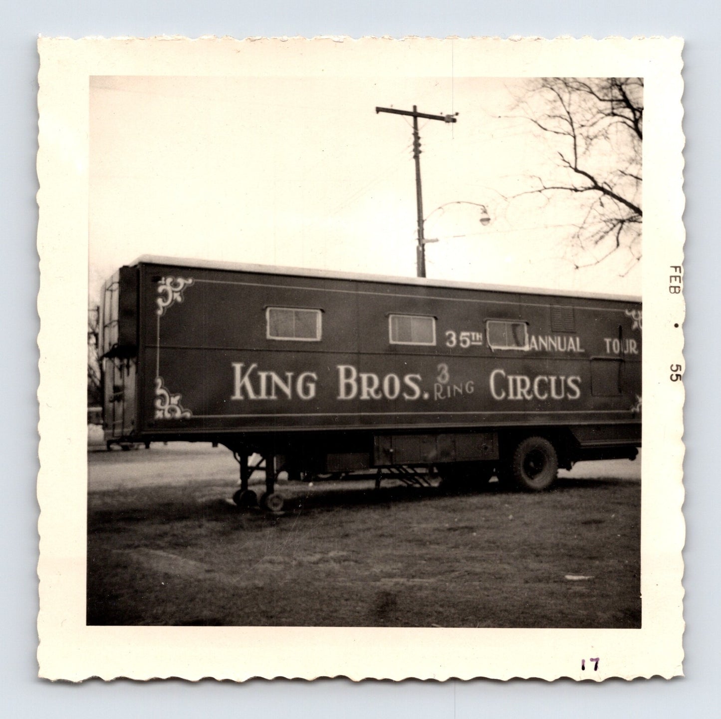 1955 King Bros Circus trailer photo showing a decorated 35th annual tour wagon with large painted circus lettering - 3.5 x 3.5