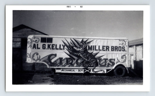 Black and white photograph of Kelly Miller Circus mechanical department truck with large tiger graphic and AL G Kelly Miller Bros Circus lettering 1955 Winnsboro Texas