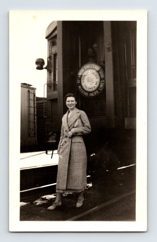 Woman standing beside Missouri Pacific railroad train car Stephen College 1940s photo