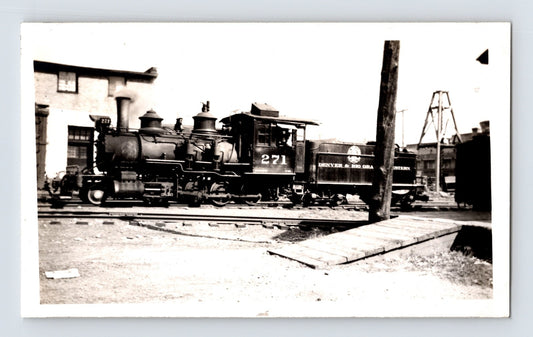 Denver Rio Grande narrow gauge 2-8-0 steam locomotive number 271 switching yard scene 1940s black and white photograph