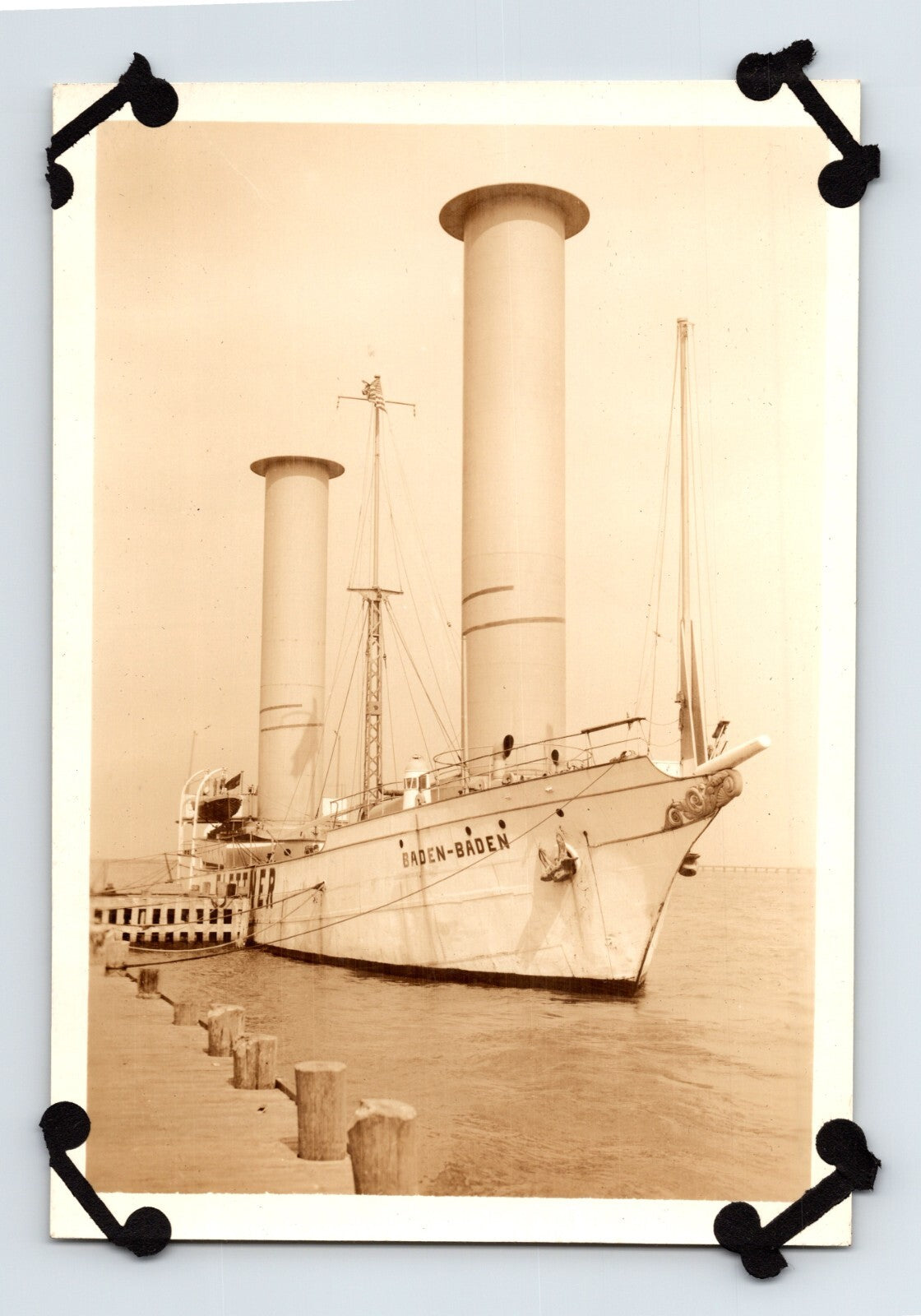 Sepia photograph of German rotor ship Baden Baden docked with twin Flettner rotors New York City harbor