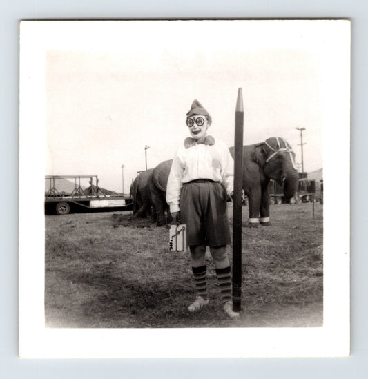 Black and white photograph of Clyde Beatty Circus clown with elephant Concordia Kansas 1954 3.5 x 3.5